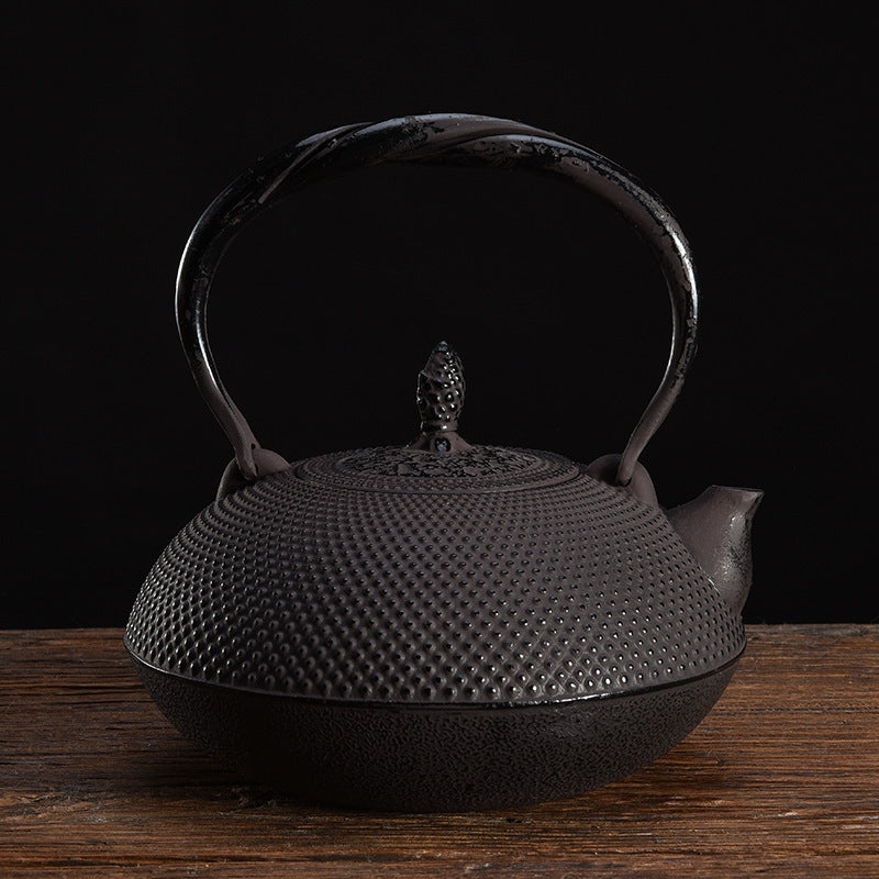 Uncoated handmade teapot