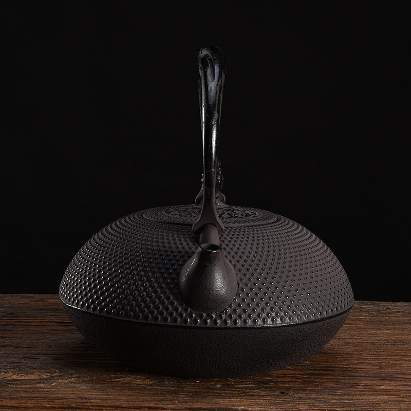 Uncoated handmade teapot