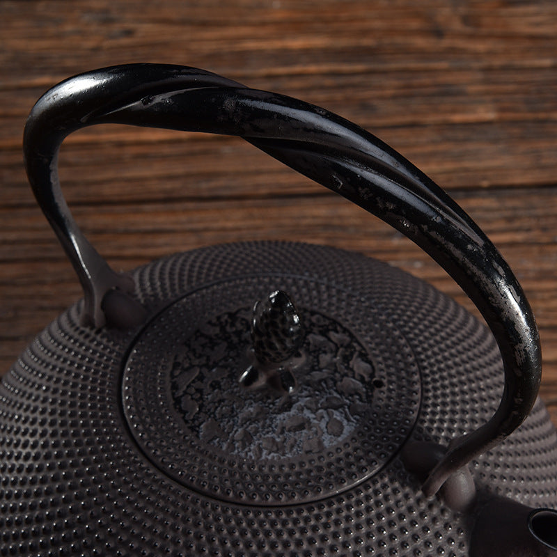 Uncoated handmade teapot