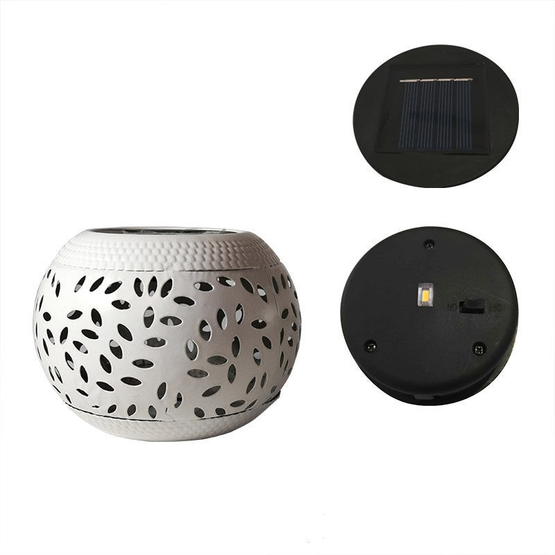 Solar garden lamp in wrought iron